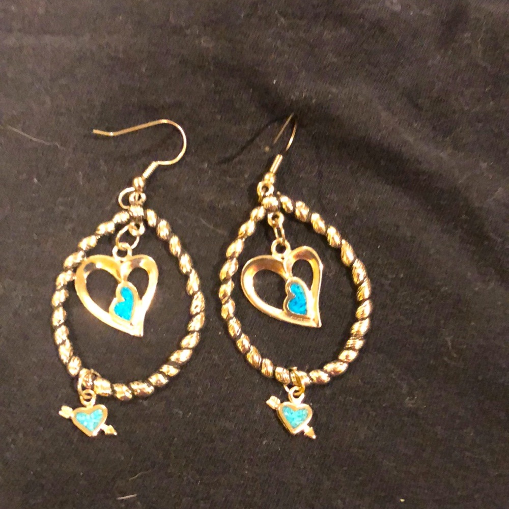 Silvertone dangle earrings with hearts
